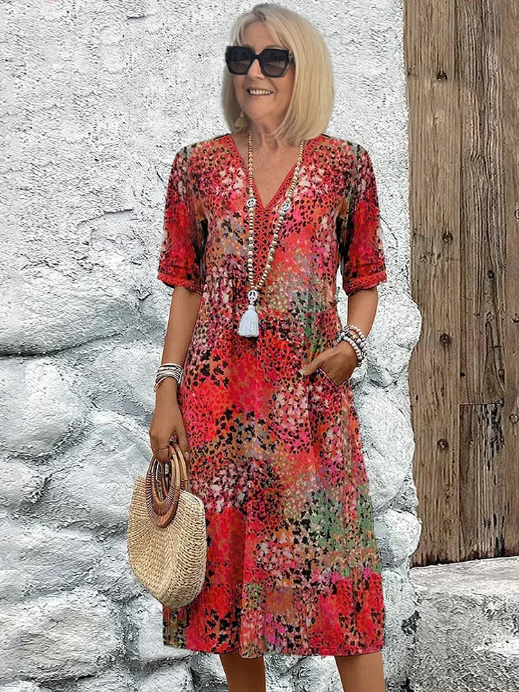 Kamil | Vibruojanti vidutinio ilgio suknelė