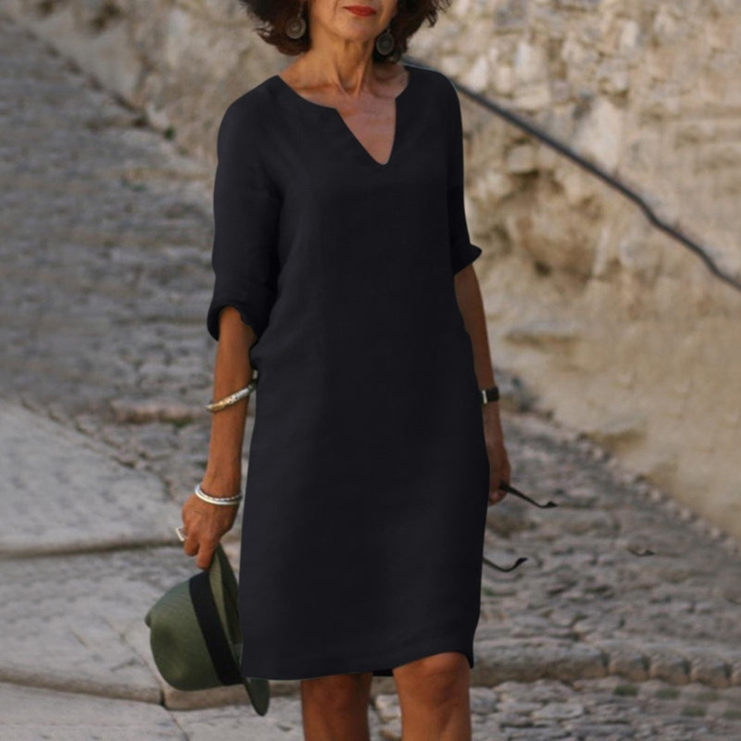 Zora | Stilinga suknelė su elegantišku V formos iškirpimu